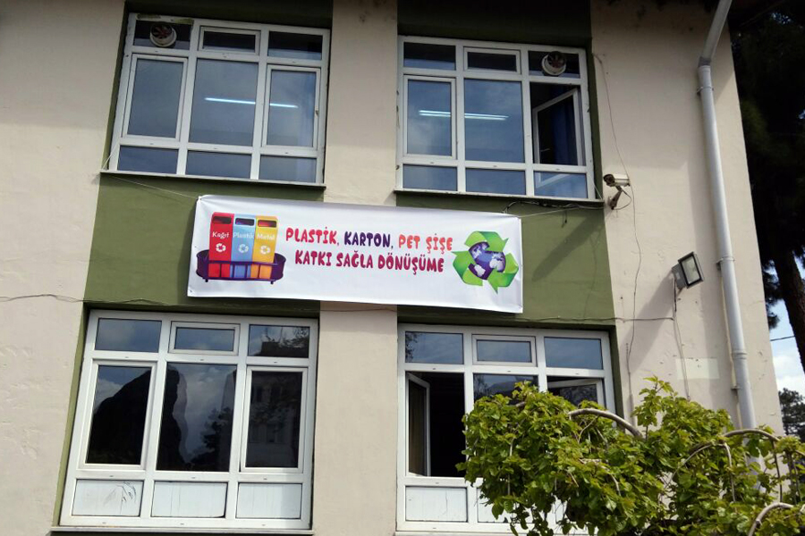 School wall with poster